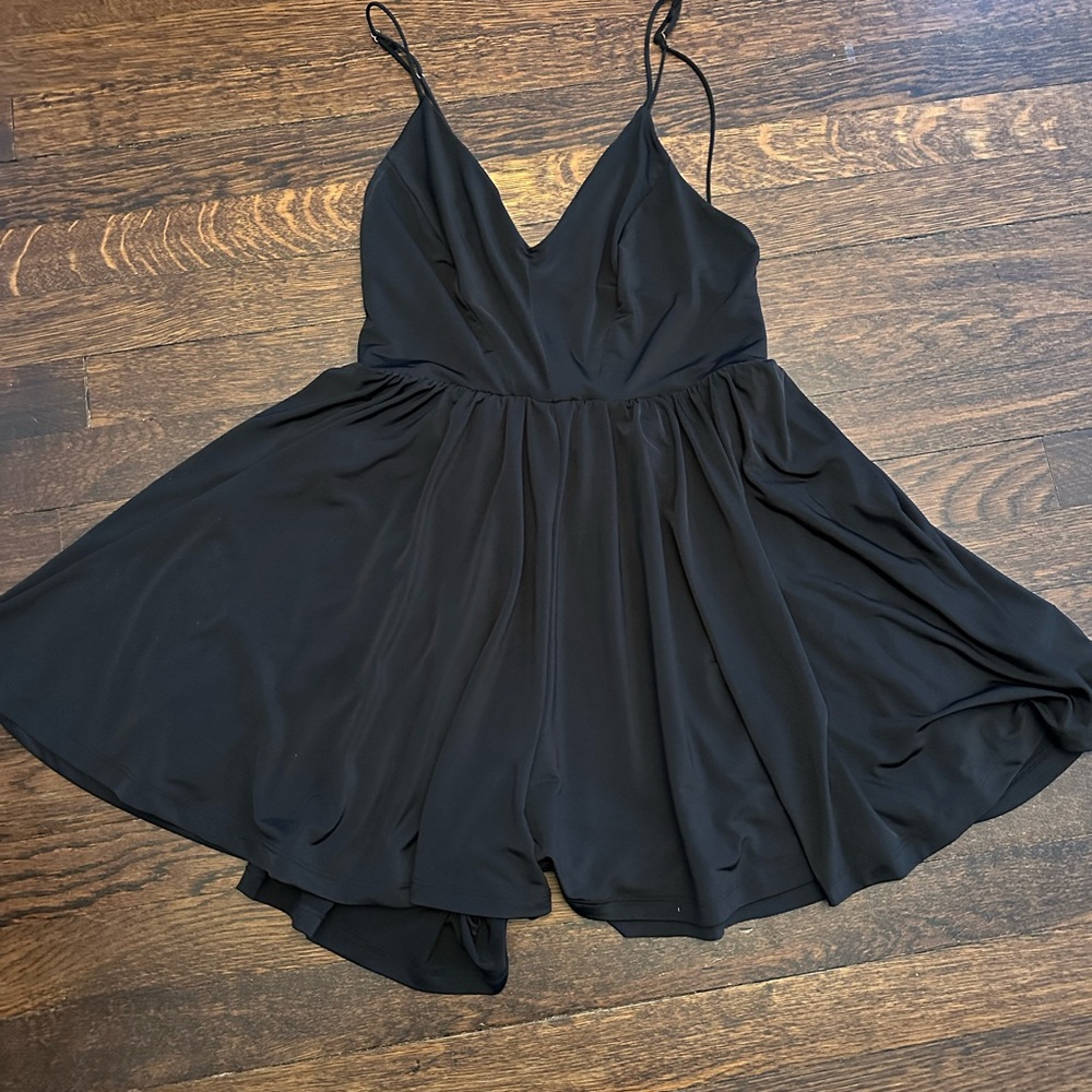 Cocktail dress that has shorts underneath- perfect condition and swingy fabric